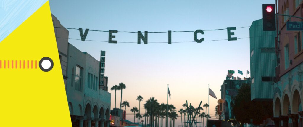 Venice sign draped across intersection.