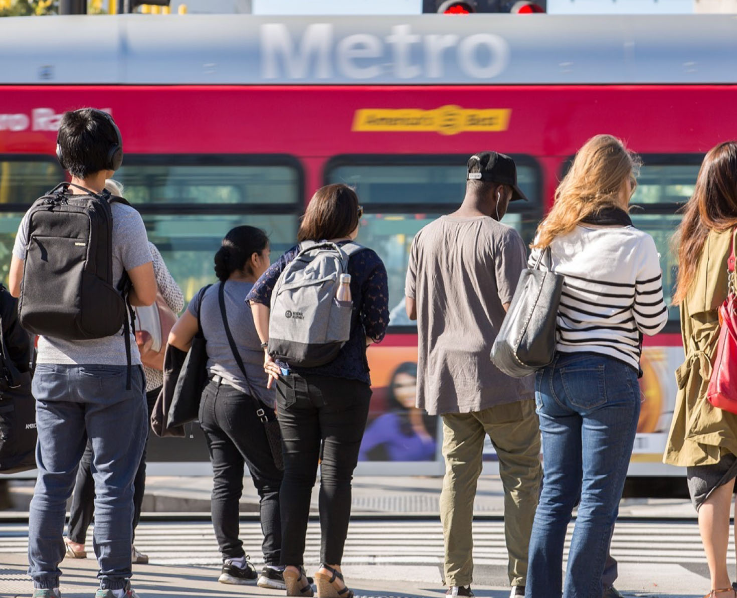 Passengers preparing to board a Metro Rapid bus.